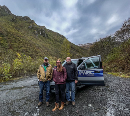 Helca Mining Company staff meet with professor Dennis Eastman at Mineral Creek, Valdez, Alaska