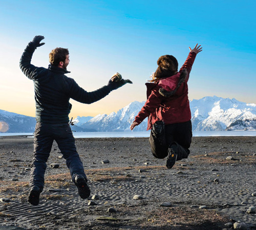 PWSC students jumping on the beach in Valdez, Alaska