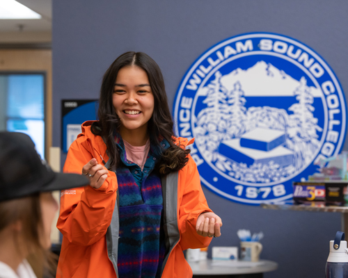 Student smiling at Prince William Sound College in Valdez, Alaska