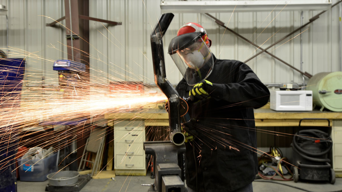 Student in the millwright shop