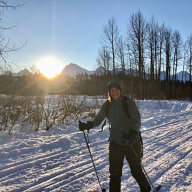 Cross-country skier on the Mineral Creek Trail in Valdez, Alaska.