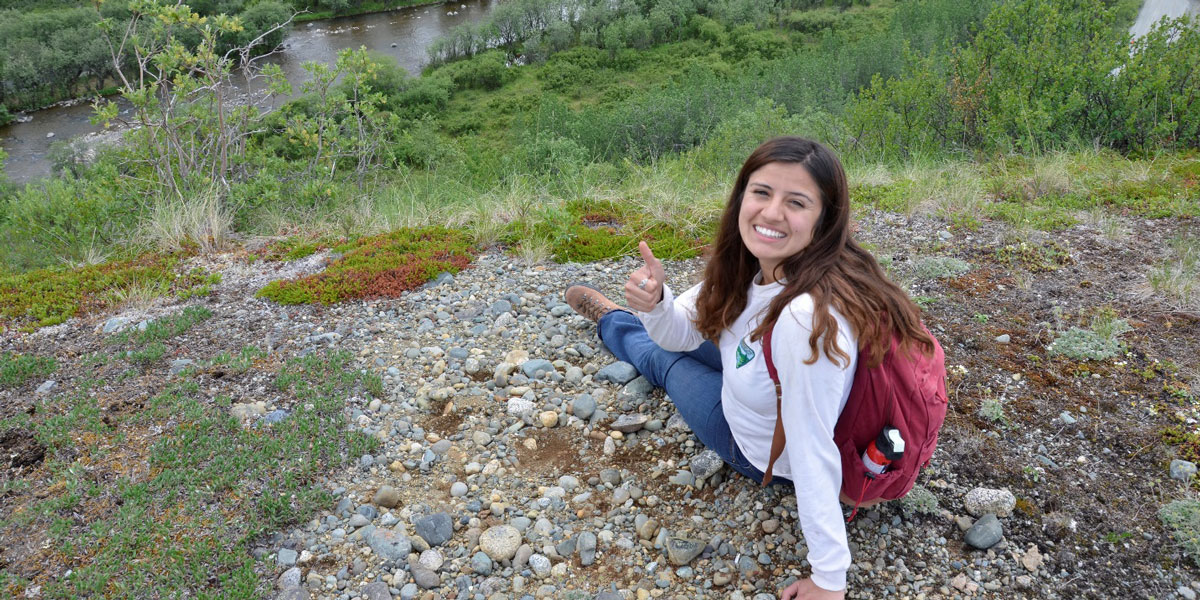 Kaylee Rodriguez, BLM intern and PWSC student explores the Tangle Lakes Archeological District