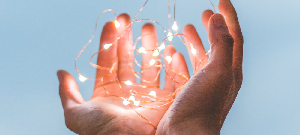 Hands holding lights
