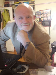Man posing facing camera. 