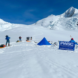 People setting it up a winter camp.
