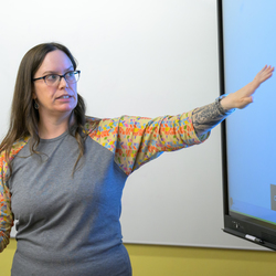 Woman teaching a class.