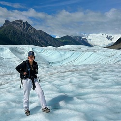girl on glacier in summer time