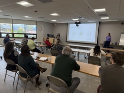 A group of people at a presentation.