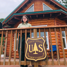 Emily Humphrey in front of the Crooked Creek Information Site