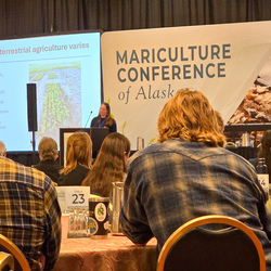 Group of people at conference. 