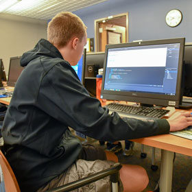 PWSC student in the computer lab at Prince William Sound College in Valdez, Alaska