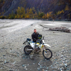 Man with motorcycle.
