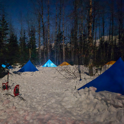 Tent set up in snow. 